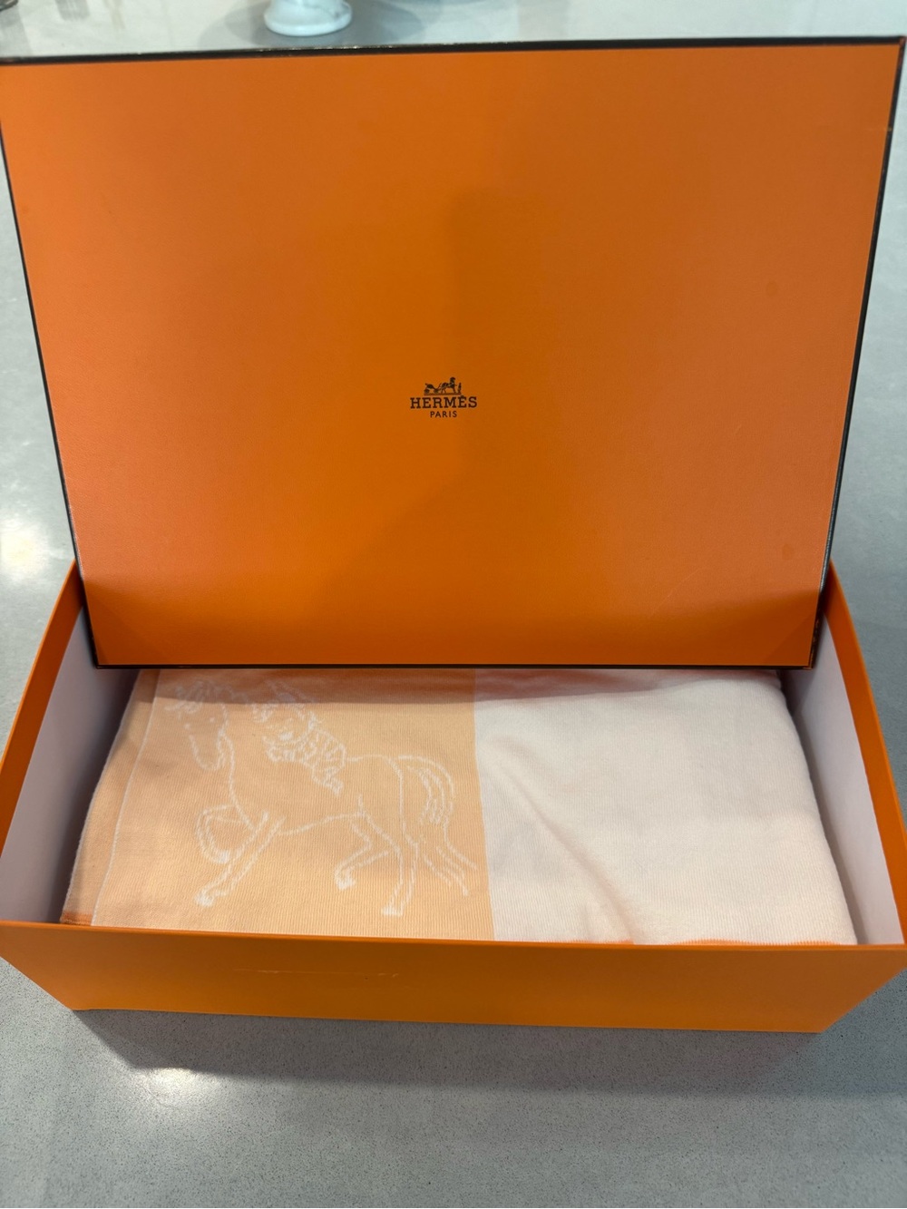Hermes kids two-tone orange and cream blanket with horse motif